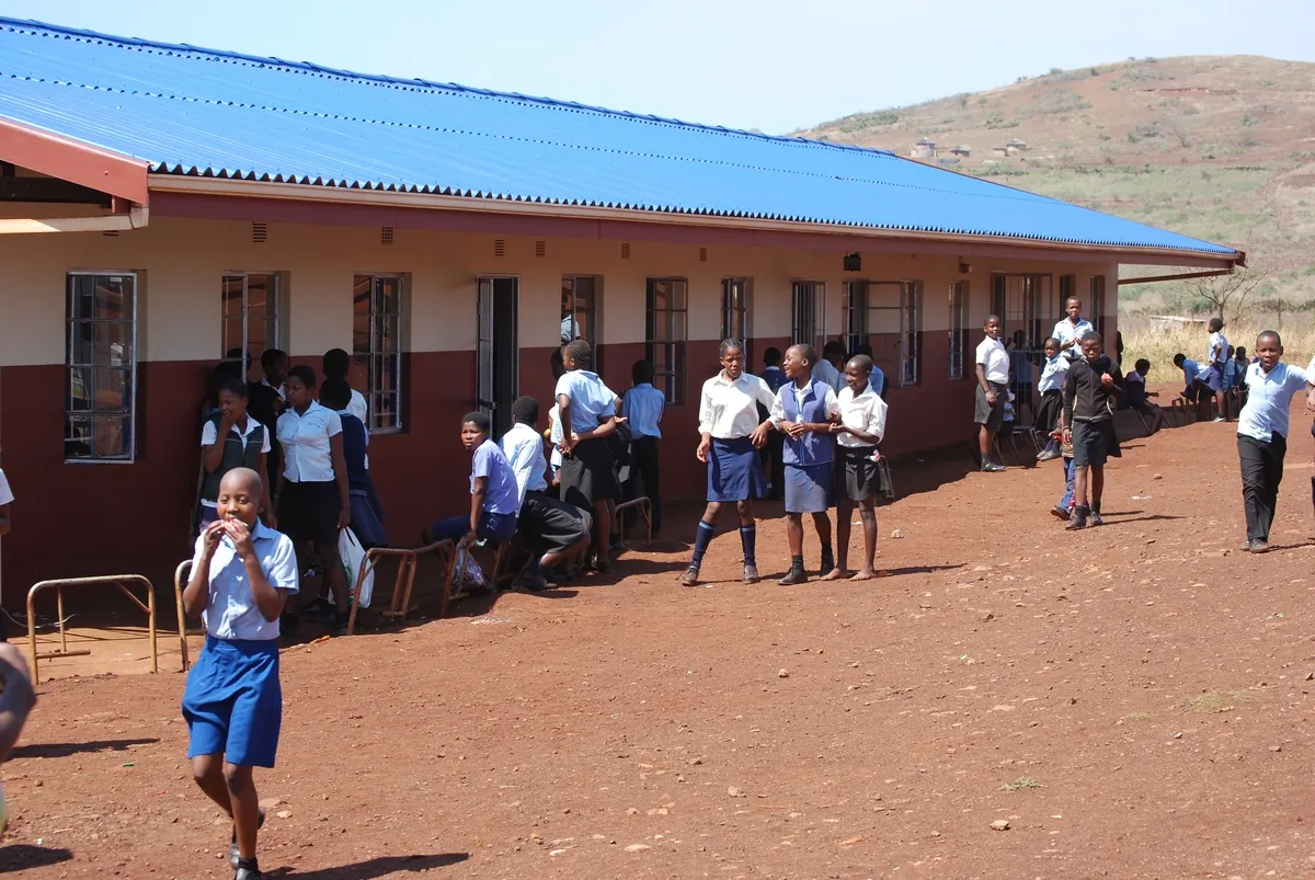 Pupils outside a school building